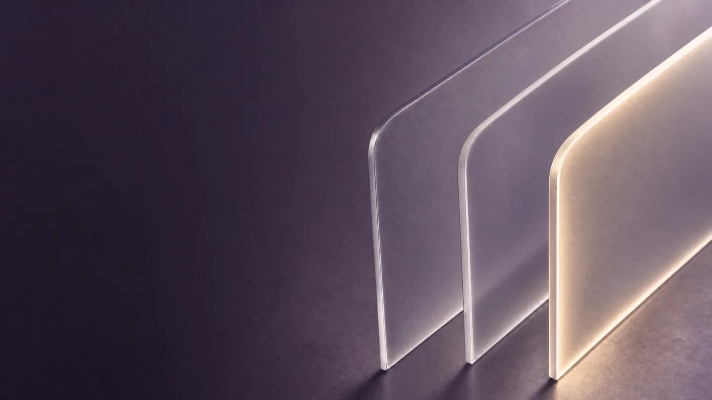Translucent glass planes become clearer in soft ivory light, representing a conversation developing into a clinical record.